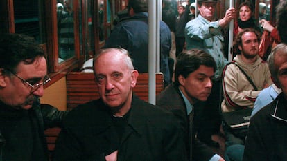 FILE - In this 2008 file photo, Argentina's Cardinal Jorge Mario Bergoglio, second from left, rides the subway in Buenos Aires, Argentina. Bergoglio, who became pope in 2013 and took the name Francis, was known for taking the train. Cardinal Bergoglio never followed the footsteps of so many fellow Roman Catholic leaders of his rank, who sought to raise their profiles, along with funds for missions back home, by networking within the deeply influential and well-resourced U.S. church. (AP Photo/Pablo Leguizamon, File)
