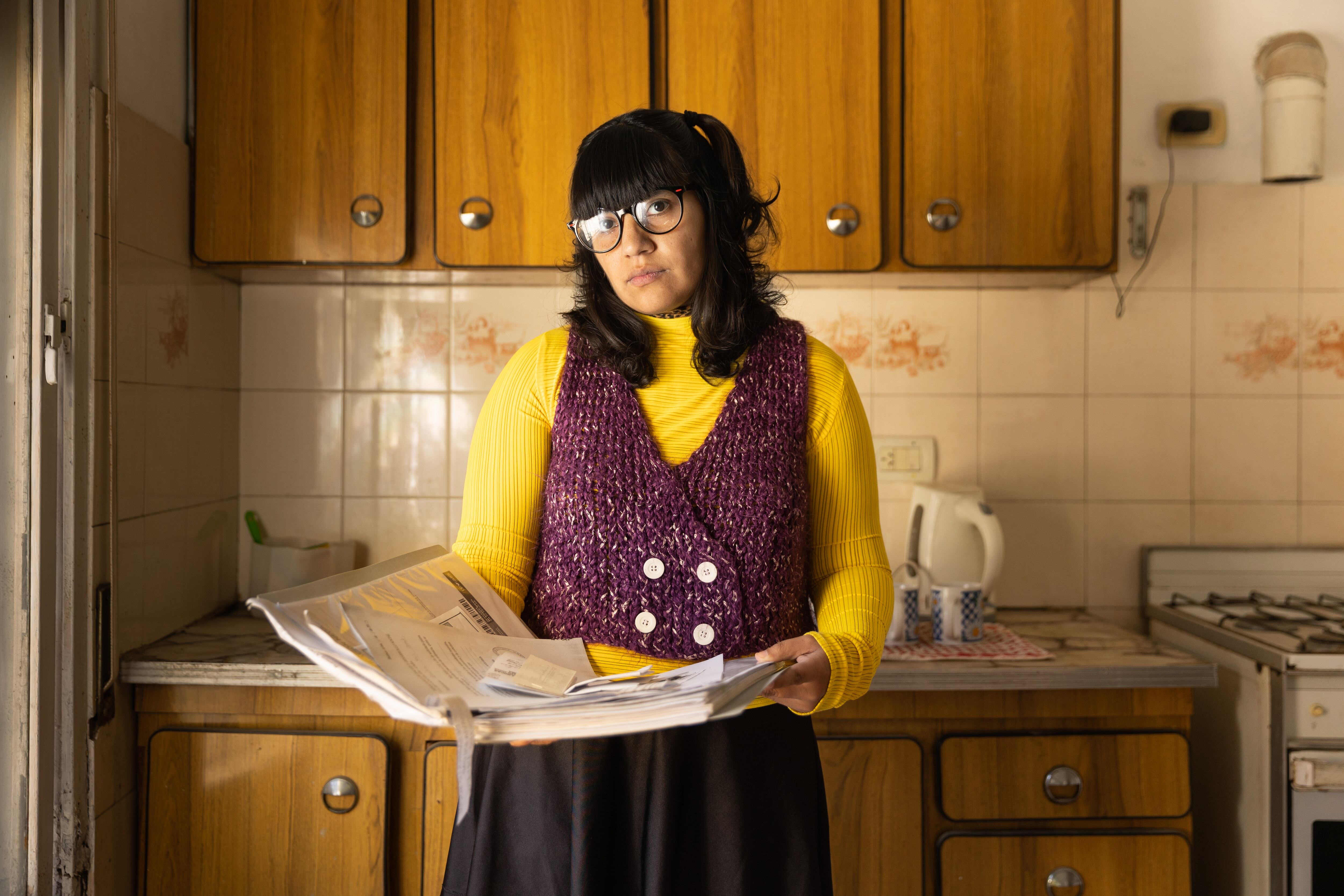 Celeste Quintana, enferma crónica de Linfoma de Hodgin, en la cocina de su casa del barrio de Quilmes, provincia de Buenos Aires. 