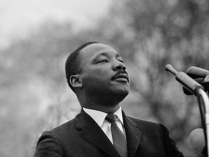 Dr. Martin Luther King, Jr. speaking before crowd of 25,000 Selma To Montgomery, Alabama civil rights marchers, in front of Montgomery, Alabama state capital building on March 25, 1965