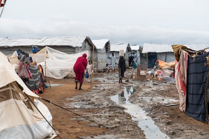 Water stagnates between tents where thousands of refugees survive in Renk.