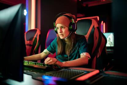 Close up of a female eSports team competing in an eSports tournament at an eSports Venue