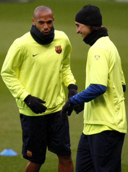 Henry e Ibrahimovic, en el entrenamiento de anoche.