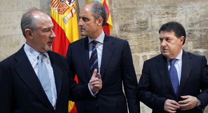 Rodrigo Rato, Francisco Camps y Jos&eacute; Luis Olivas, en el Palau de la Generalitat en 2011.