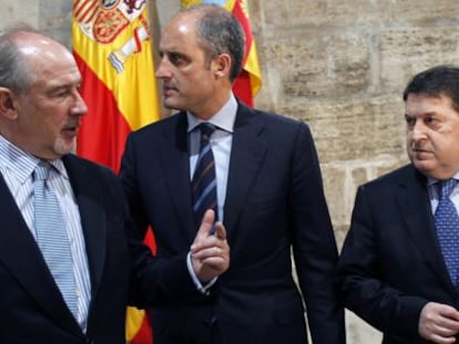 Rodrigo Rato, Francisco Camps y Jos&eacute; Luis Olivas, en el Palau de la Generalitat en 2011.