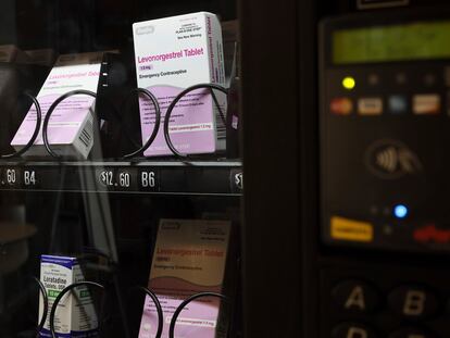 A vending machine is stocked with emergency contraceptives at Odegaard Library on the campus of the University of Washington.