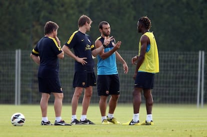 Mascherano con Tito Vilanova durante un entrenamiento del Barça.