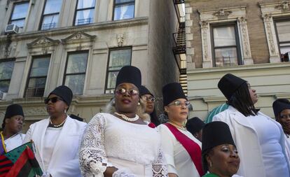 Participantes de la marcha por el 50 aniversario del día de los afroamericanos el pasado 15 de septiembre en Harlem, Nueva York.