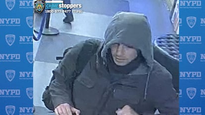 Image distributed by the NYPD of a man suspected of involvement in the murder of Brian Thompson.