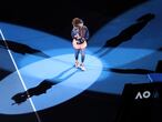 Japan's Naomi Osaka carries the Daphne Akhurst Memorial Cup around Rod Laver Arena after defeating United States Jennifer Brady in the women's singles final at the Australian Open tennis championship in Melbourne, Australia, Saturday, Feb. 20, 2021.(AP Photo/Hamish Blair)