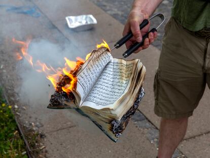 A Quran is burned by an activist from the small right-wing group, Danish Activists, on July 28, 2023 in Copenhagen, Denmark.