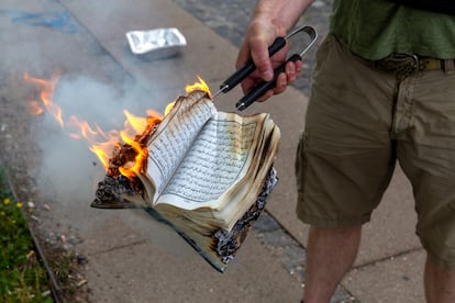 A Quran is burned by an activist from the small right-wing group, Danish Activists in Copenhagen, Denmark