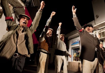 A scene from the play, in which anarchist farmworkers rise up against the local authorities.