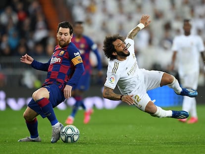 Marcelo cae ante Messi en el último clásico en el Bernabéu.