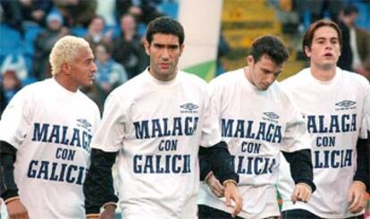 Darío Silva, Fernando Sanz, Josemi y Miguel Ángel, del Málaga, ayer en Riazor.