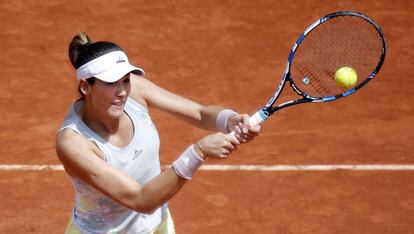 Muguruza devuelve la pelota contra Georges.