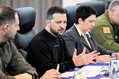 Ukraine's President Volodymyr Zelenskyy, center, speaks to Japan's Prime Minister Fumio Kishida, during their bilateral meeting, following the conclusion of the G7 Summit Leaders' Meeting in Hiroshima Sunday, May 21, 2023.