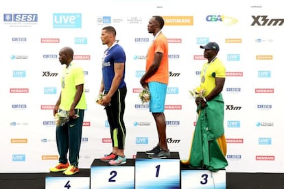 Churandy Martina, Ryan Bailley, Usain Bolt y Jose Carlos Gomes, en el podio.