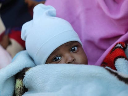 Un niño migrante en uno centro de detención en Bengasi (Libia), el pasado 13 de diciembre.