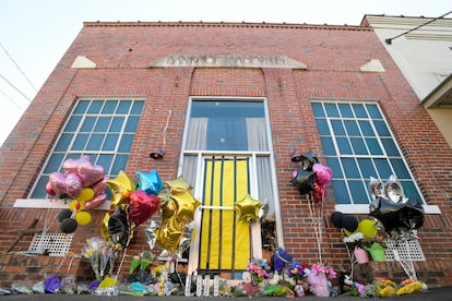 A makeshift memorial is created at the scene of the fatal shooting at a dance studio in Dadeville, Ala., Wednesday April 19, 2023