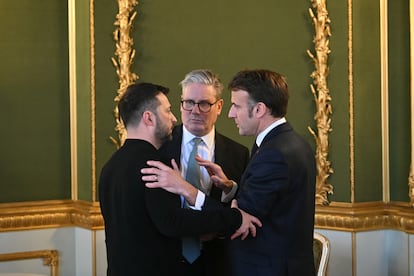 Ukraine's President Volodymyr Zelenskiy, Britain's Prime Minister Keir Starmer and France's President Emmanuel Macron hold a meeting during a summit at Lancaster House on March 2, 2025 in London, England.