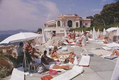 Guests sunbathing on a terrace at the Hotel du Cap-Eden-Roc in Antibes on the French Riviera, August 1969