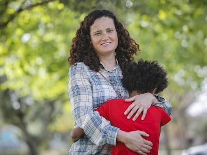 Lucía Cuesta with her son, Ibu, in a park in Paterna, Valencia.