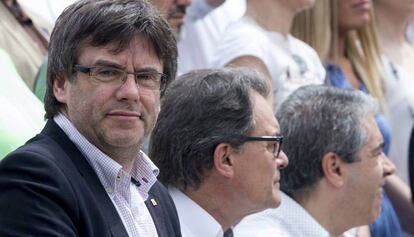 Puigdemont, amb Mas i Homs en un acte de campanya.