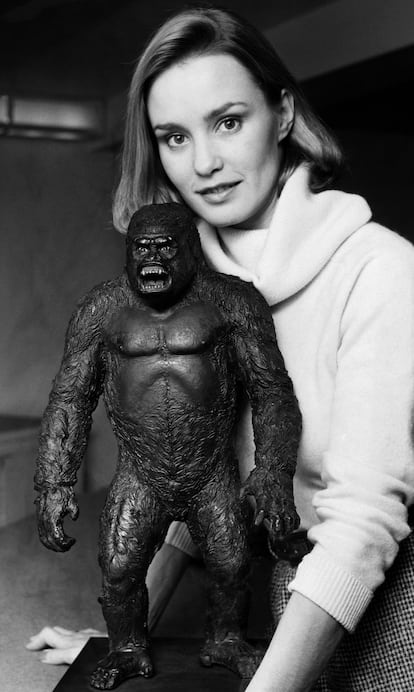 Jessica Lange poses with a statue of King Kong, in 1976.