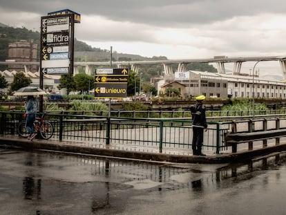 GENOA, LIGURIA - AUGUST 14: The Morandi motorway bridge is seen after the collapse on August 14, 2018 in Genoa, Italy. At least 30 people were killed today when the giant motorway bridge collapsed in north-western Italy, which saw a vast stretch of the A10 freeway tumble on to railway lines. The bridge failure was the country's deadliest in years with the country's deputy transport minister warning the death toll could climb further. (Photo by Awakening/Getty Images)