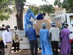 COVID-19 vaccines arrive to be destroyed, in Lilongwe, Malawi, Wednesday, May 19, 2021. Malawi has burned nearly 20,000 doses of AstraZeneca vaccines because they had expired. The government incinerated over 19,000 doses of the vaccine at Kamuzu Central Hospital in the capital Lilongwe. According to Health Secretary Charles Mwansambo the vaccines were the remainder of 102,000 doses that arrived in Malawi on March 26 with just 18 days until they expired on April 13. (AP Photo/Jacob Nankhonya)