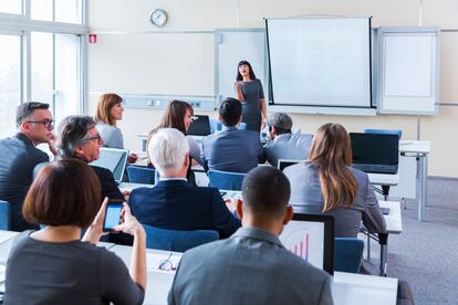 Business people in education room listening lecture