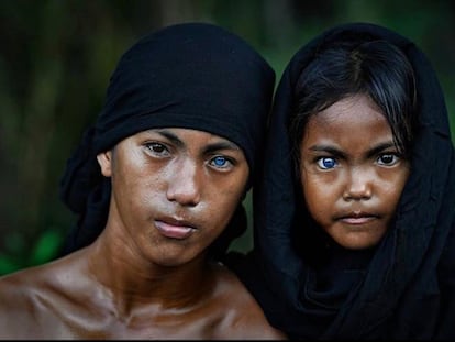 Members of the Buton tribe in Indonesia, where a genetic mutation causes their eyes to be electric blue.