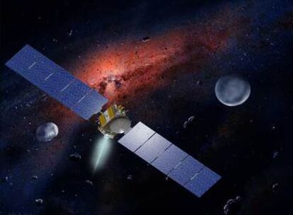 La sonda <i>Dawn,</i> entre los asteroides Vesta (izquierda) y Ceres, en una representación artística.
