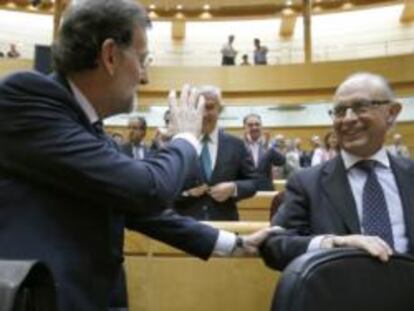 El G-7 presiona para que Berlín acepte la solución a la banca planteada por Rajoy