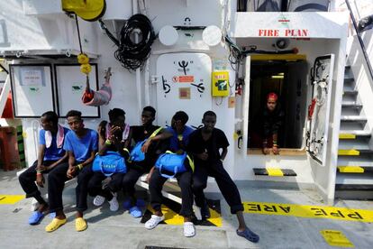 Un grupo de migrantes en el acuerdo este martes.