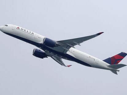 A Delta Air Lines Airbus A350-900 plane takes off from Sydney Airport in Sydney, Australia, October 28, 2020.