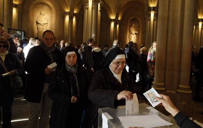 A nun casts her vote in Barcelona.