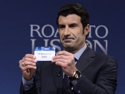 Former Barcelona and Real Madrid midfielder Luis Figo plucks the Catalan club out of the tombola at the Uefa draw ceremony on Monday. 