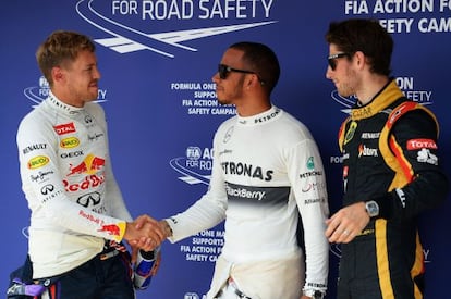 Lewis Hamilton saluda a Vettel junto a Romain Grosjean