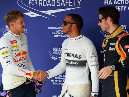 Lewis Hamilton saluda a Vettel junto a Romain Grosjean 