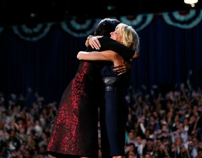 First lady Michelle Obama embraces Dr. Jill Biden after President Barack Obamas victory speech in Chicago
