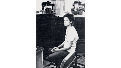 Dilma Rousseff appears before a military court in Rio de Janeiro in 1970, while her military accusers hide their faces.