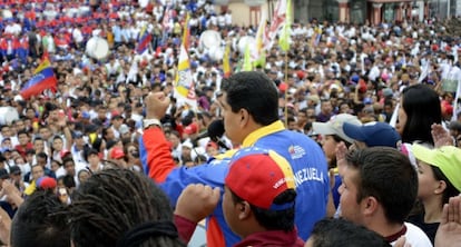 Maduro addresses the crowd from the Miraflores palace.