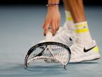 Tennis - Australian Open - Men's Singles Final - Melbourne Park, Melbourne, Australia, February 21, 2021 Russia’s Daniil Medvedev smashes his racket during his final match against Serbia's Novak Djokovic REUTERS/Asanka Brendon Ratnayake