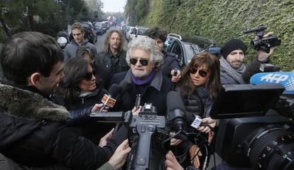 Five Stars movement's leader and former comedian Beppe Grillo arrives to vote at a polling station in Saint Ilario near Genova on February 25, 2013.Polls reopened in Italy on Monday for a second and final day of voting in a critical election for the future of the eurozone in which the centre-left Democratic Party is expected to win but fall short of a governing majority. AFP PHOTO / FABIO MUZZI