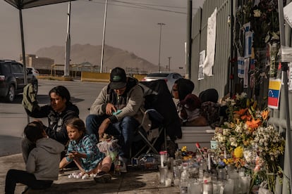 Dozens of South and Central American migrants wait outside the National Institute of Migration for reports of the 29 migrants injured and 38 killed during the fire on March 27, 2023