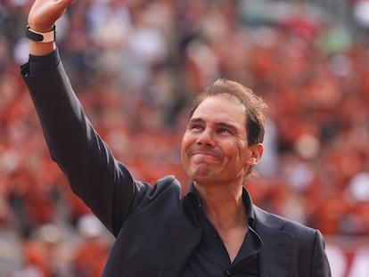 Rafa Nadal waves to the crowd during a farewell ceremony at center court Philippe-Chatrier, at the Roland-Garros stadium, in Paris, Sunday May 25, 2025. (AP Photo/Lindsey Wasson)