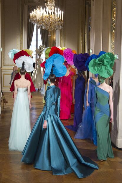 Models present creations by French designer Alexis Mabille as part of his Haute Couture Spring-Summer 2012 fashion show in Paris