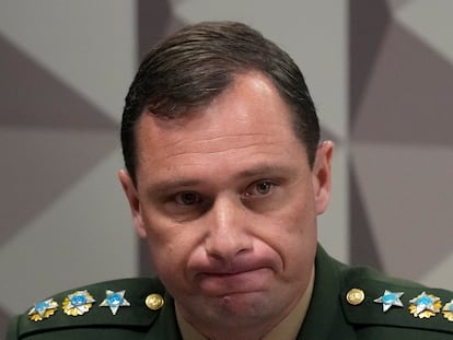 Lt. Col. Mauro Cid appears before a parliamentary commission in Brasilia last July after his release from prison.