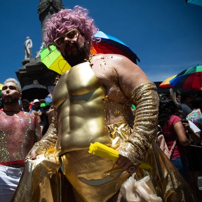 Participants march during the Pride Parade in support of the LGBTQ+ community, in Mexico City on June 24, 2023. (Photo by Rodrigo OROPEZA / AFP)
